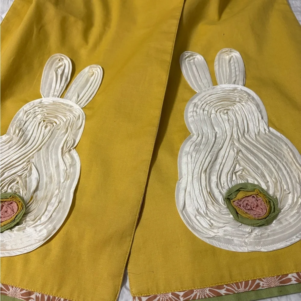 Cute bunny table runner by Pier 1 Imports. Golden yellow with cream bunnies.